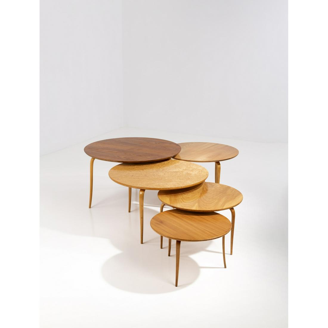 Bruno Mathsson (1907-1988) Annika: Bruno Mathsson (1907-1988)AnnikaSet of five coffee tablesBirch wood, beechwood and teakEdited by Firma Karl MathssonManufacturer's label under each tableModel created in 1936Smallest: H 41,5 × &#