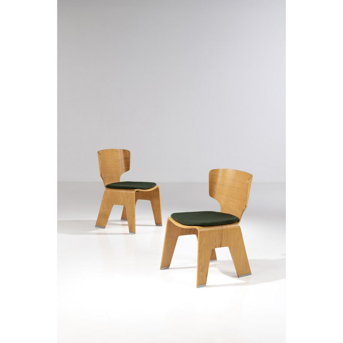 Kenzo Tange (1913-2005) Pair of chairs: Kenzo Tange (1913-2005)Pair of chairsBent-laminated birch plywood, metal and fabricEdited by Tendo MokkoManufacturer’s plaque beneath the seatingModel created in 1957H 78,5 × L 50 × P