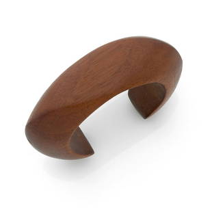 Catherine NOLL (1945-1994) 1970s: Catherine NOLL (1945-1994)1970sOpen bangle bracelet in precious carved woodMonogrammedDiameter : 5,6 cmHeight : 2,9 cmGranddaughter of the sculptor Alexandre Noll, Catherine Noll liked to work with wo