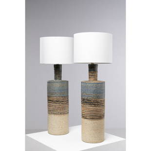 Tue Poulsen (Born in 1939) Pair of lamps: Tue Poulsen (Born in 1939)Pair of lampsGlazed ceramicTue Poulsen Studio editionOne lamp signed 'TUE DENMARK'Model created in the 1960sLamp bodies: H 76,5 x D 17 cmIncluding lampshade: H 83 x D 30 cm