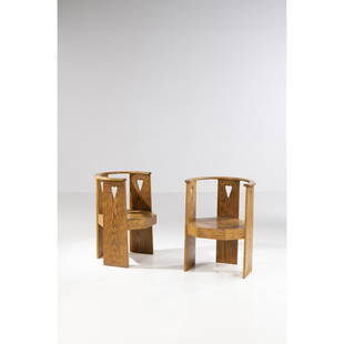 Eliel Saarinen (1873-1950) Pair of armchairs: Eliel Saarinen (1873-1950)Pair of armchairsOak woodModel created circa 1910H 82,5 × L 63 × P 57 cmBibliography:- M. Hausen, K. Mikkola, A-L. Arnberg and T. Valto,The Architecture of Eliel Sa