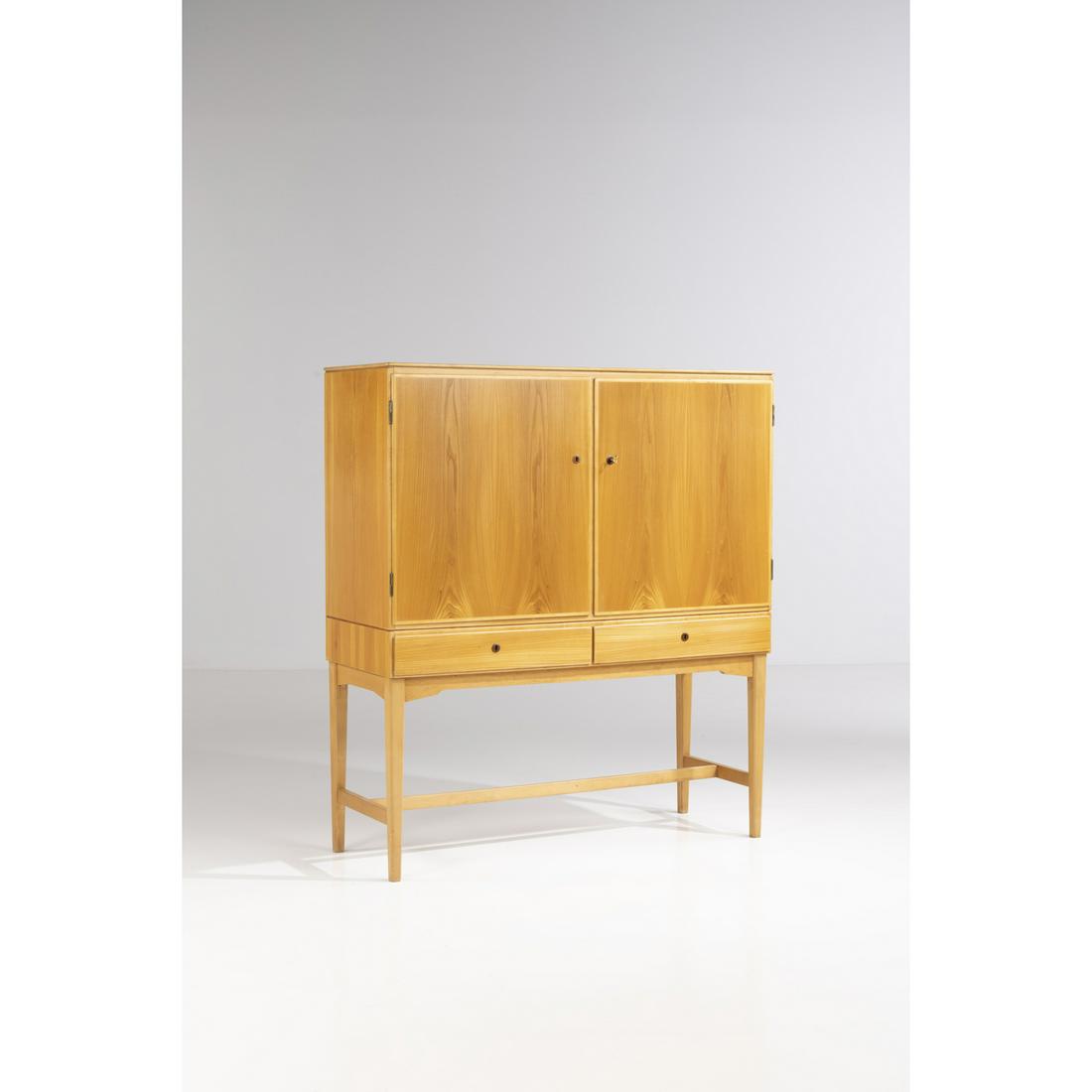 Carl-Axel Acking (1910-2001) Cabinet: Carl-Axel Acking (1910-2001)CabinetOak woodEdited by Nordiska KompanietStamped 'NK 1946' on the backManufacturer’s label in inkModel created in the 1940sH 133,5 × L 118 × P 45 cm