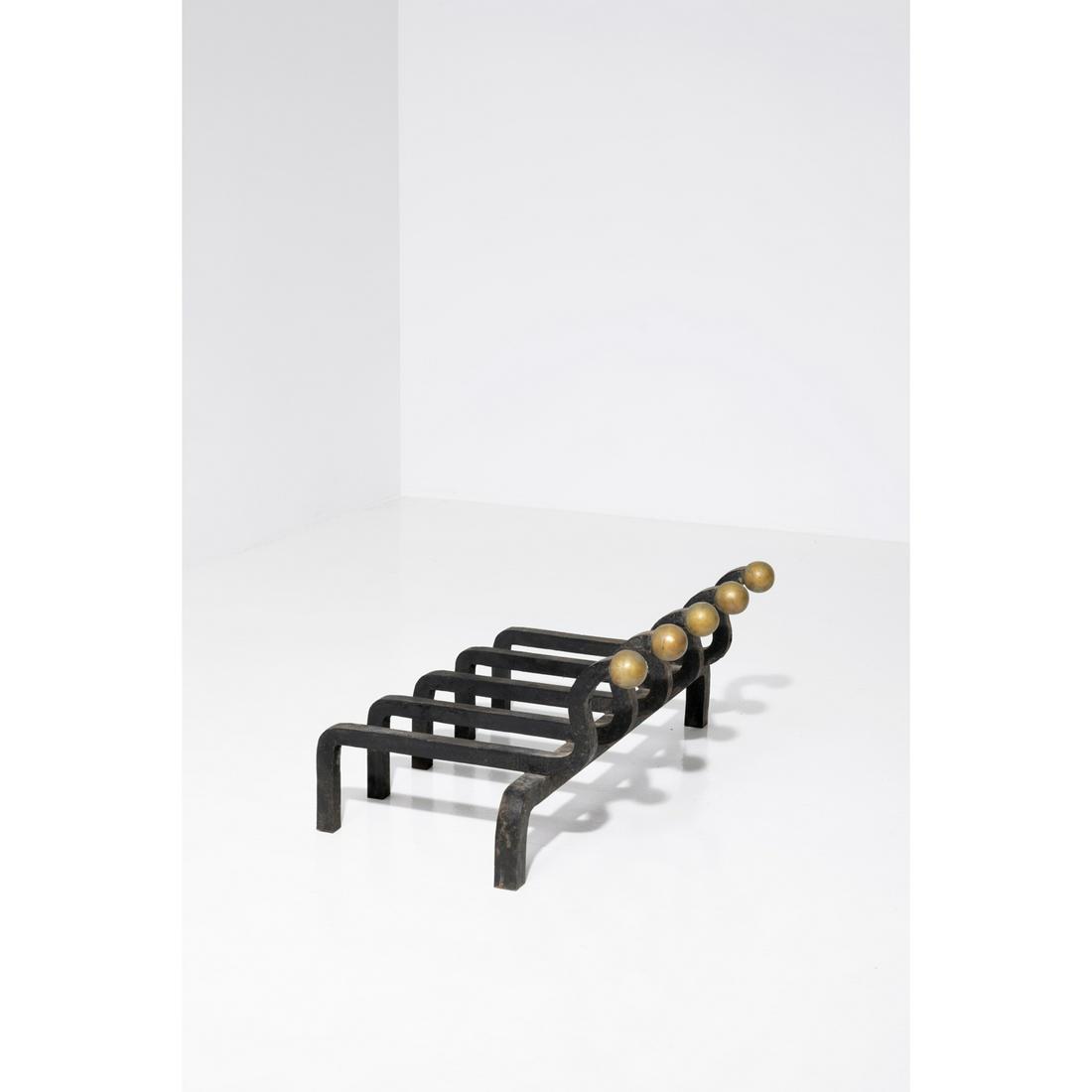 Jean Royère (1902-1981) Log-basket: Jean Royère (1902-1981)Log-basketWrought iron and brassModel created circa 1945H 23,5 × L 64 × P 40 cmBibliography: Jean Royère, Galerie Jacques Lacoste and Galerie Patrick Seguin,