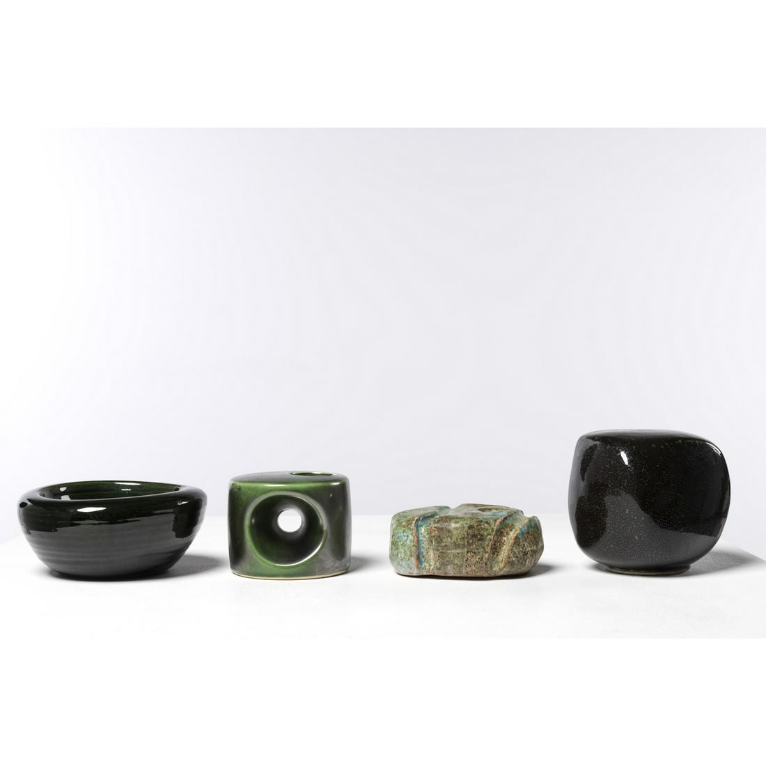 Set of four ceramics Accolay (1945-1992): Set of four ceramicsAccolay (1945-1992)Small green cup Glazed ceramicSigned beneath the baseH: 6 - D: 16 cmCharles Hair (born 1955)Freeform sculptureGlazed black ceramic Monogrammed beneath the baseH
