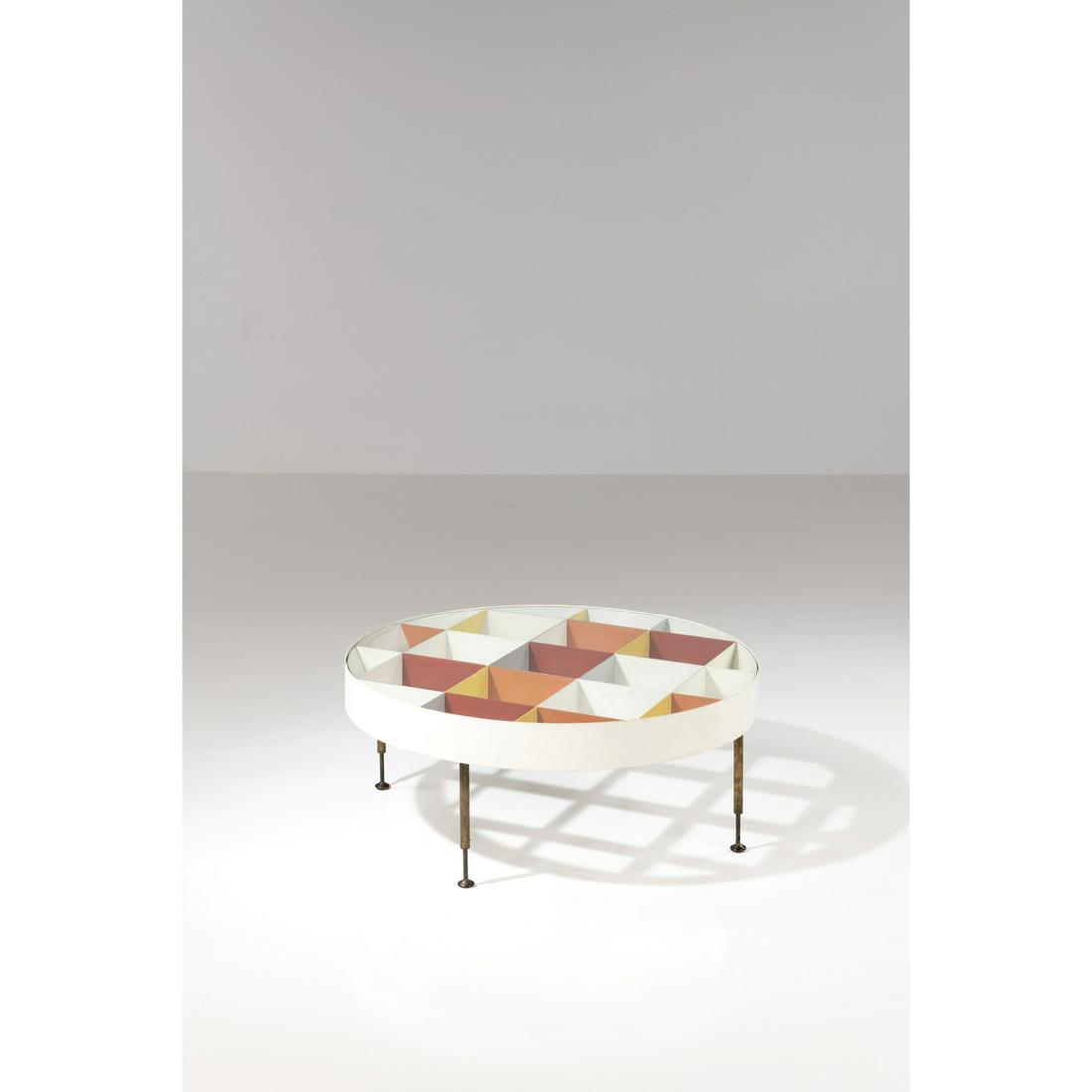 Gio Ponti (1891-1979) Coffee table: Gio Ponti (1891-1979)Coffee tableBrass, lacquered metal and glassProduction Giordano ChiesaModel created circa 1953H 37 × Ø 90 cmBibliography:- Domus n°335, October 1957, pp. 22-24 for