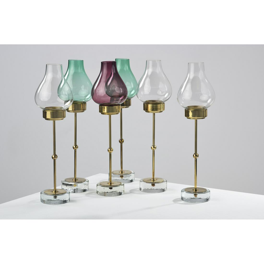 Gunnar Ander (1908-1976) Set of six stem vases: Gunnar Ander (1908-1976)Set of six stem vasesGlass and golden brassEdited by Ystad MetallModel created circa 1960H: 30 cm