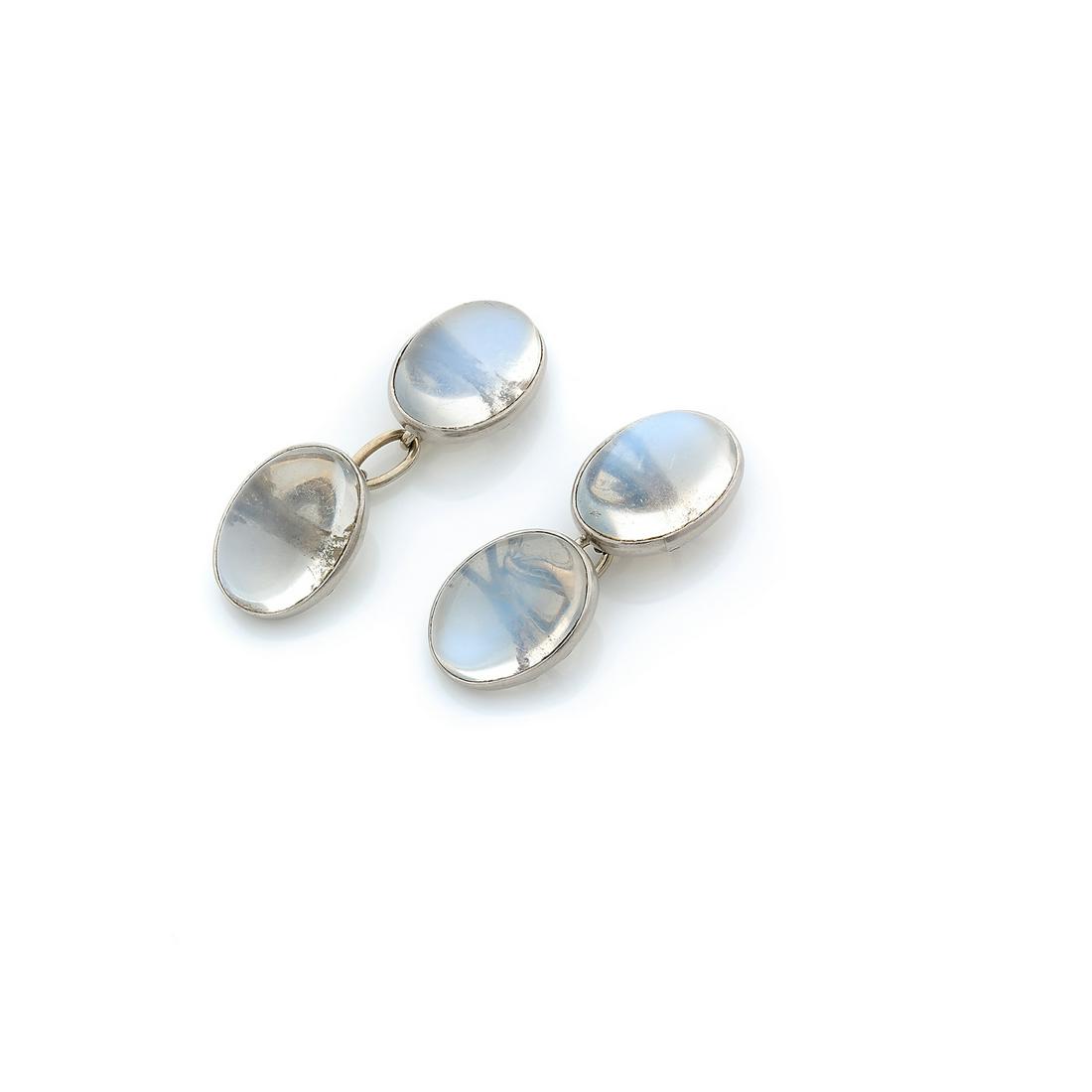 Pair of cufflinks of oval shape in grey gold set with moonstone cabochons  Gross weight: 8,3 g (1 of 2)