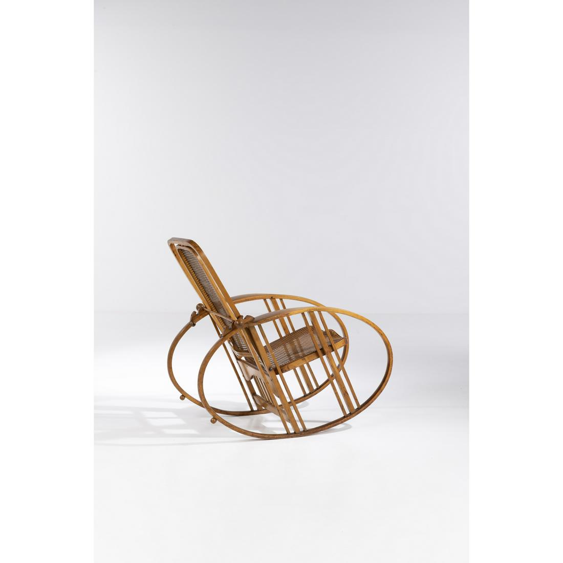Max Fabiani (1865-1962) Model 267: Max Fabiani (1865-1962)Model 267Rocking chairVarnished wood and Vienna strawModel created circa 1914H (variable) 95 × L130 × P 71 cmProvenance: Model created for the Antonio Volpe company, U