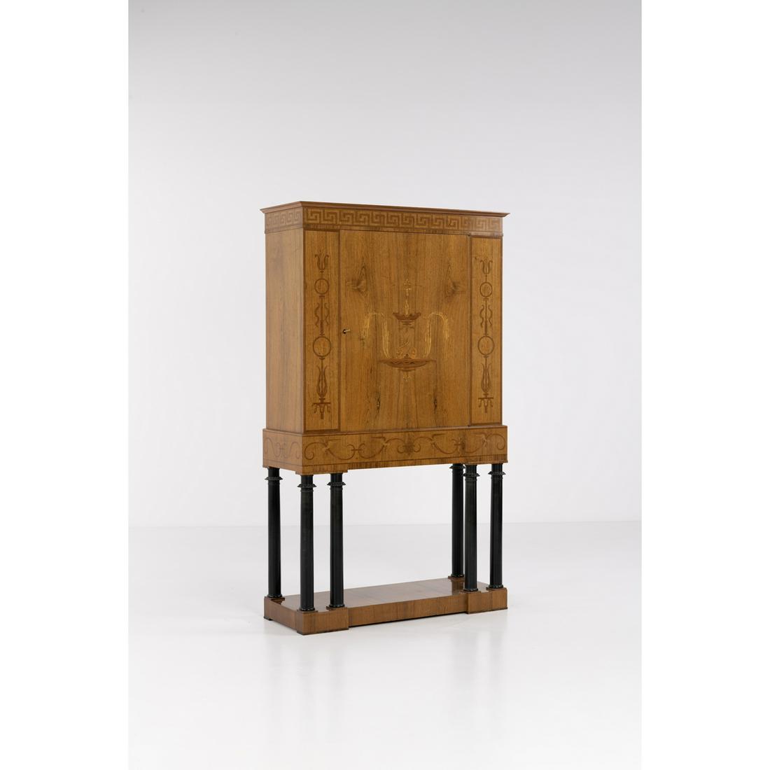Oscar Nilsson (1895-1975) Cabinet: Oscar Nilsson (1895-1975)CabinetWalnut, mahogany, rosewood and brassEdited by Wickman & Nybergs MöbleringsHand signed and dated labelModel created in 1926H 179 × L 105 × P 39,5 cmExhibi
