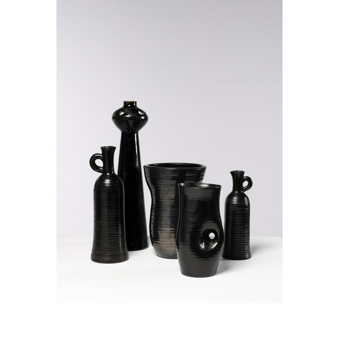 Accolay (1945-1992) Set of five glazed ceramics: Accolay (1945-1992)Set of five glazed ceramics Signed 'Accolay' under the base, pictogram of the workshopMonogrammed 'EFModels created around 1960SolifloreH 54 x 14 cmPitcher H 27,5 x 16 cmPitcherH 38