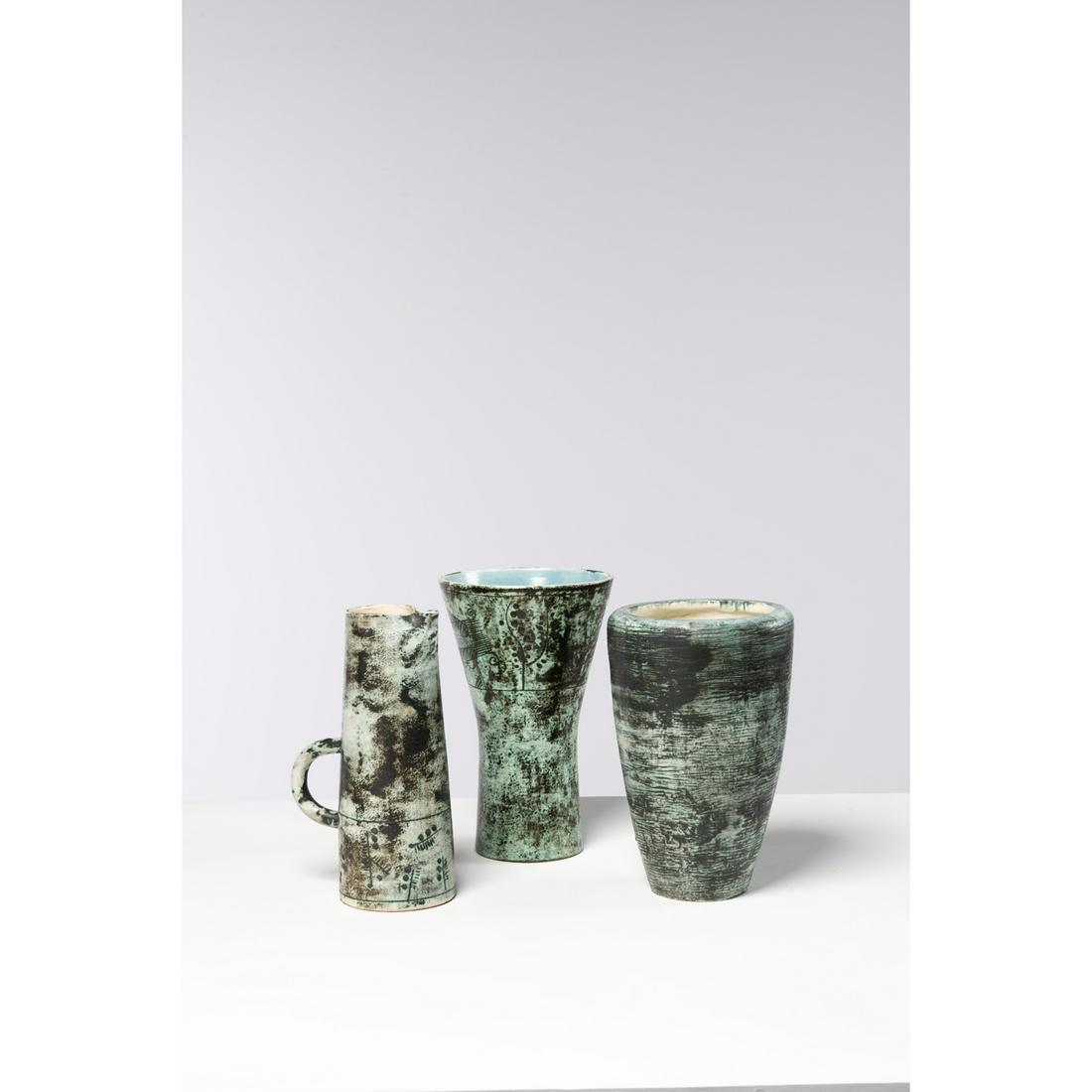 Jacques Blin (1920-1995) Set of three glazed ceramics: Jacques Blin (1920-1995)Set of three glazed ceramicsModel created around 1960Vase Cornet H 29 x W 18 cmVase H 28 x W 17 cmPitcher H 28 x W 17 cmAll signed under the base 'J.Blin'.Provenance : Private