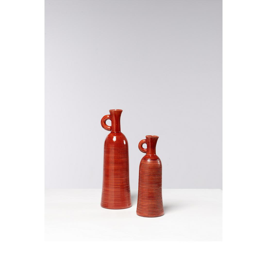 Accolay (1945-1992) Two bottles: Accolay (1945-1992)Two bottlesEnamelled ceramicsSigned 'Accolay' under the base, workshop pictogramMonogrammed 'EF'Models created circa 1960H 39.5 x W 12 cmH 30 x 10 cm