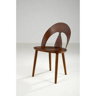 Børge Mogensen (1914-1972) Shell chair: Børge Mogensen (1914-1972)Shell chairLaminated teak and beechwood Edited by Erhard Rasmussen DenmarkModel created in 1949 H: 80,6 x L: 49 x W: 42 cm