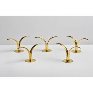 Ivar ÅLENIUS-BJÖRK (1905-1978) Five candle holders: Ivar ÅLENIUS-BJÖRK (1905-1978)Five candle holders Lily' modelGilded brass Model created around 1940Publisher Ystad MetallStamp. of the publisher under the basesH 12 x W 22 cm