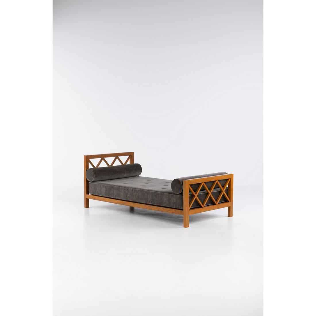 Jean Royère (1902-1981) 'Croisillons' bed: Jean Royère (1902-1981)'Croisillons' bedOak wood and fabricModel created c. 1955H 80 × L 205 × W 100 cmProvenance:- Private collection, Beirut, Lebanon- Galerie Jacques Lacoste and Gale