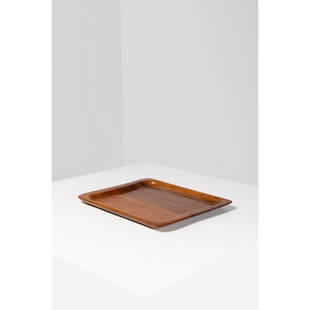 Alexandre Noll (1890-1970) Plate: Alexandre Noll (1890-1970)PlateWalnutIncised signature 'A Noll' on the undersideModel created c. 1950H 2,5 × L 41 × W 33 cm