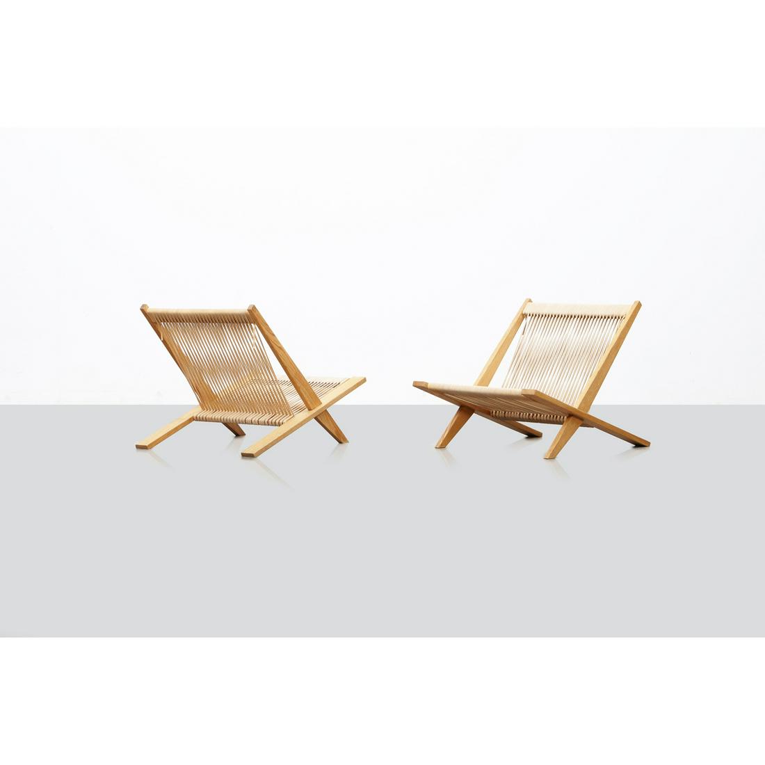 Poul Kjaerholm (1929-1980) & Jorgen Hoj (1925-1994) Pair of lounge chairs: Poul Kjaerholm (1929-1980) & Jorgen Hoj (1925-1994)Pair of lounge chairsAsh wood and ropeEdited by Thorald Madsen SnedkeriModel created in 1952H 60 × L 65 × W 75 cmBibliography: N. Oda, 'Dan