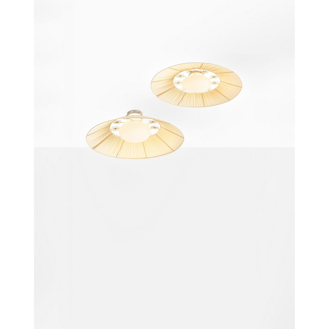 Gunilla Jung (1905-1939) Pair of ceiling lamps: Gunilla Jung (1905-1939)Pair of ceiling lampsGlass, fabric, brass and metalEdited by OrnoModel created circa 1945H 26 × Ø 80 cm