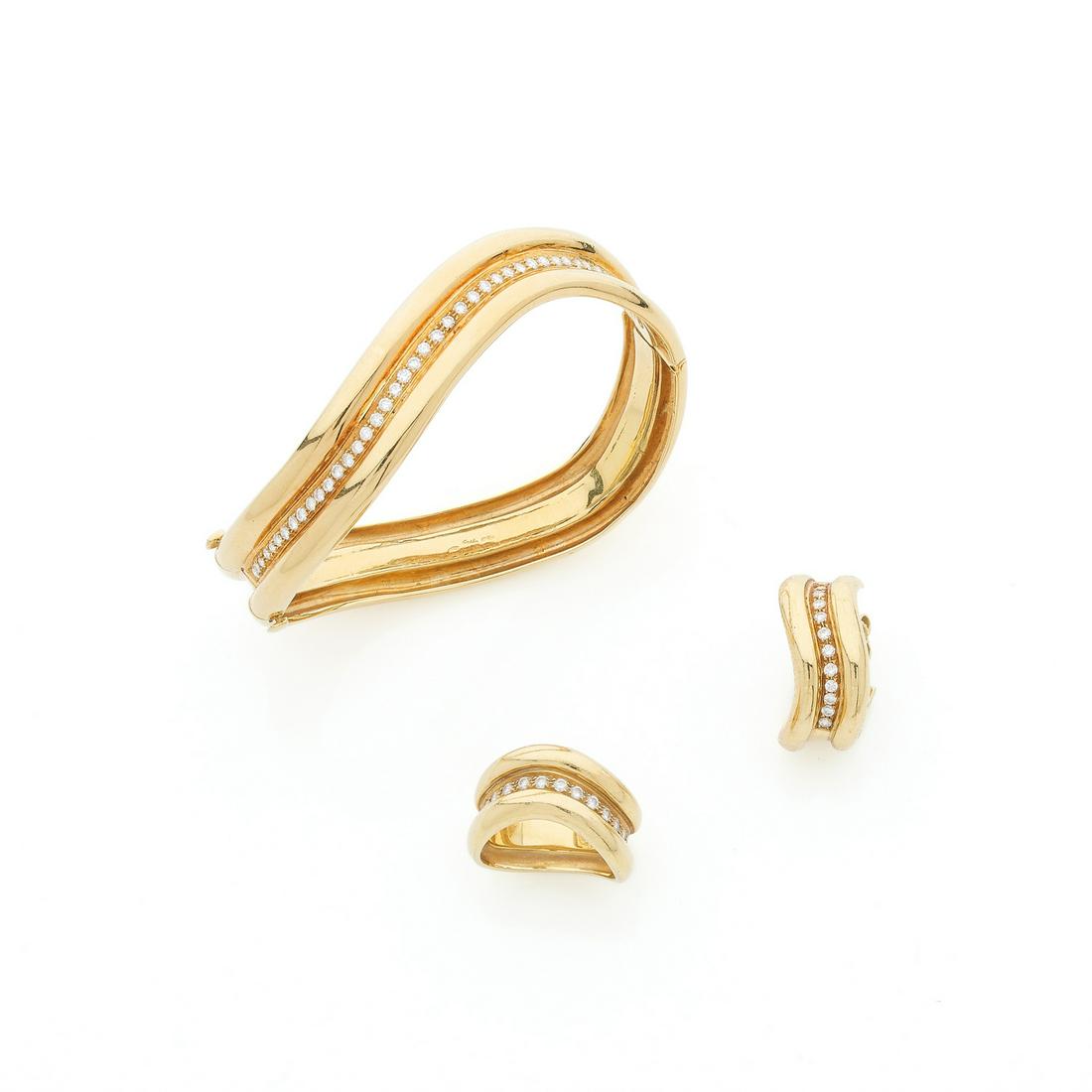CUSI, Milan Half jewelry set in 18k (750‰) yellow gold and diamonds, composed of a bracelet, a (1 of 1)