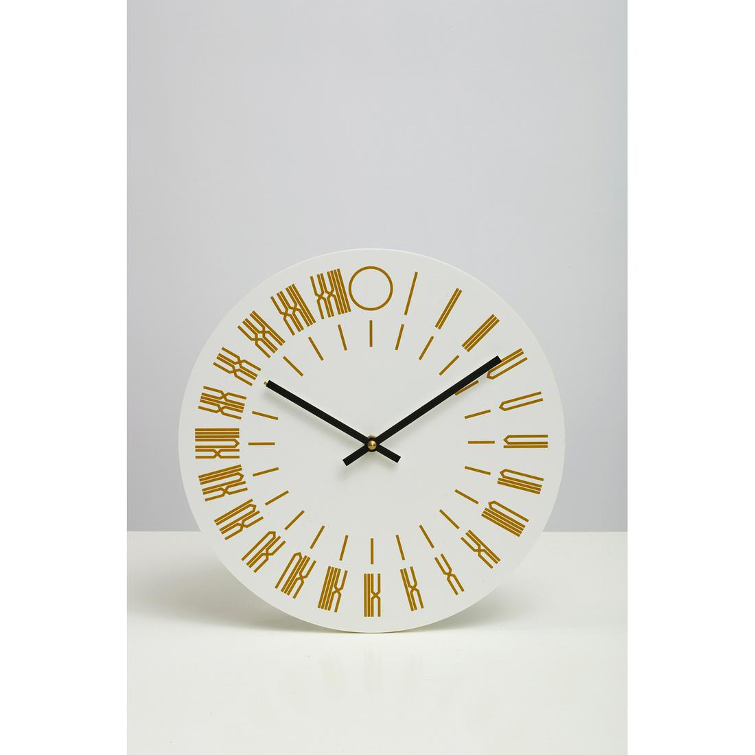 Tauba Auerbach (b. 1981) and Assembly Studio Design Issue 20 - 2013: Tauba Auerbach (b. 1981) and Assembly Studio Design Issue 20 - 2013Screen-printed composite panel, enamelled aluminium and brass 24-hour analogue clockEdition of 1,500 copies Publisher The Thing Quart