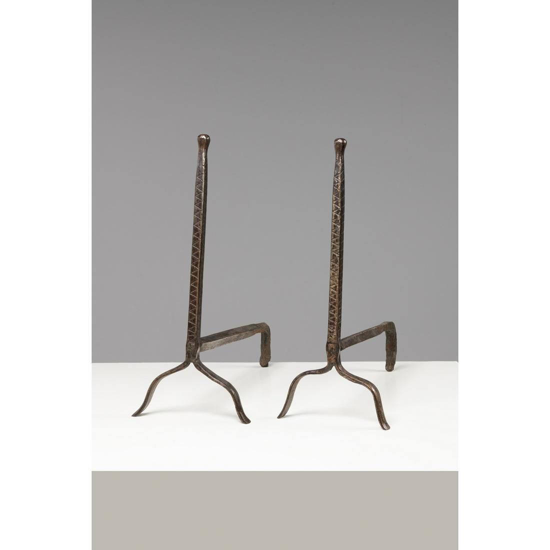 French work from the 1940s In the taste of Edgard BRANDT: French work from the 1940s In the taste of Edgard BRANDT Pair of andirons Wrought iron H 55 x W 51 x D 23 cm