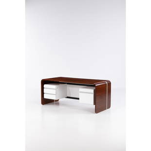 Michel Boyer (1935-2011) Desk: Michel Boyer (1935-2011)DeskMahogany veneer, lacquered wood and aluminumEdited by TFMManufacturer’s stamp inside a drawerModel created circa 1970H 75,5 × L 180 × W 80cmBibliography: "L