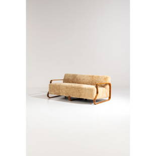 ƒ Alvar Aalto (1898-1976) Sofa model no. 544 – Three-footed version: ƒ Alvar Aalto (1898-1976)Sofa model no. 544 – Three-footed versionBent birch and fabricEdited by FinmarModel created in 1932H 69 x L 164 x W 82 cm