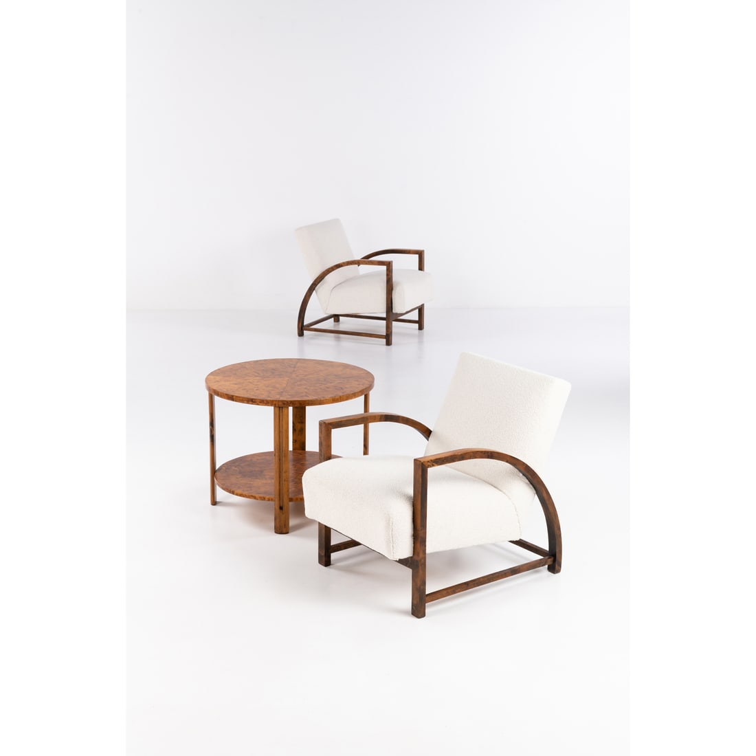 Maija Heikinheimo (1908-1963) Set composed of a pair of 'Helvi' armchairs and a coffee table: Maija Heikinheimo (1908-1963)Set composed of a pair of 'Helvi' armchairs and a coffee tableWood and fabricAsko editionModel created in the 1930sTable: H 55 x D 69 cmArmchairs: H 72 x L 59 x W 75 cm