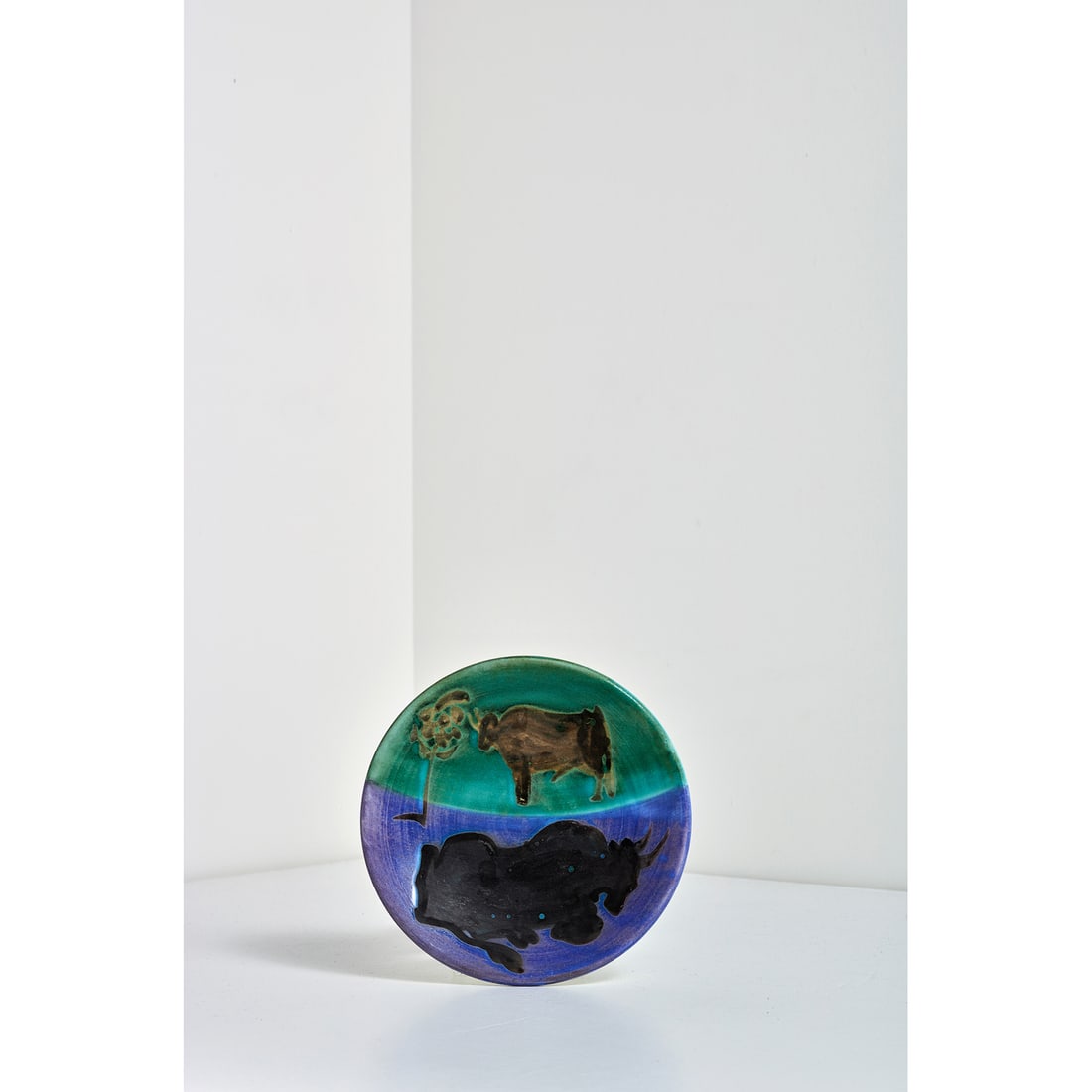 Pablo Picasso (1881-1973) Toros: Pablo Picasso (1881-1973)TorosPlateWhite earthenware, engobe and oxidised paraffin decoration, white, blue, green and black glazeInscribed"Edition Picasso Madoura"Stamped "Edition Picasso" and "Madour