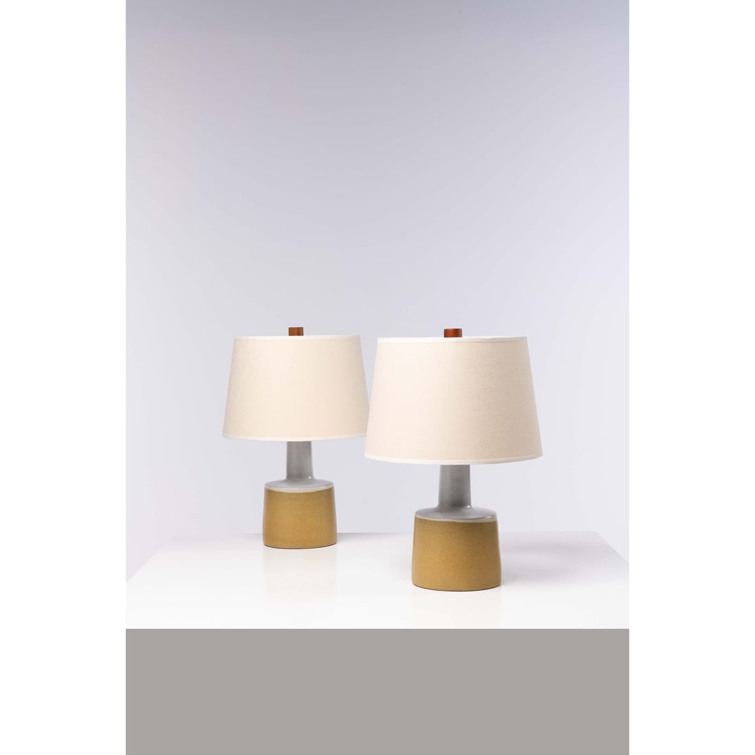 Jane & Gordon Martz (20th c.) Pair of table lamps: Jane & Gordon Martz (20th c.)Pair of table lampsWalnut, ceramic, brass and fabricEdited by Marshall StudiosSigned "Martz" on the baseModel created in the 1960sH 45 × Ø 31 cm