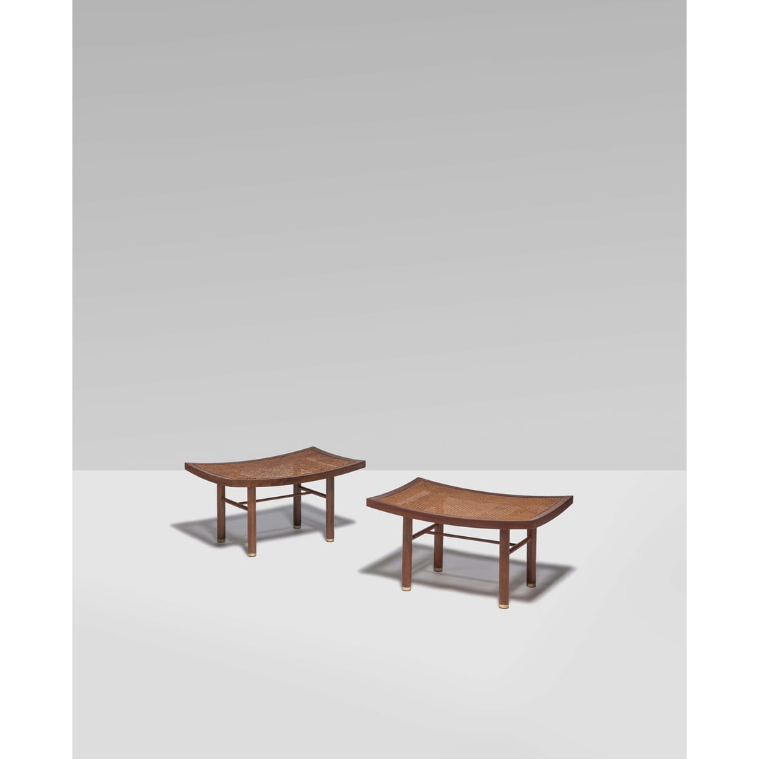 Michael Taylor (20th c.) Pair of stools: Michael Taylor (20th c.)Pair of stoolsWalnut, caning and brass Edited by Baker FurnitureManufacturer's label beneath the seatingModel created in the 1950sH 38 × L 71 × P 45,5 cm