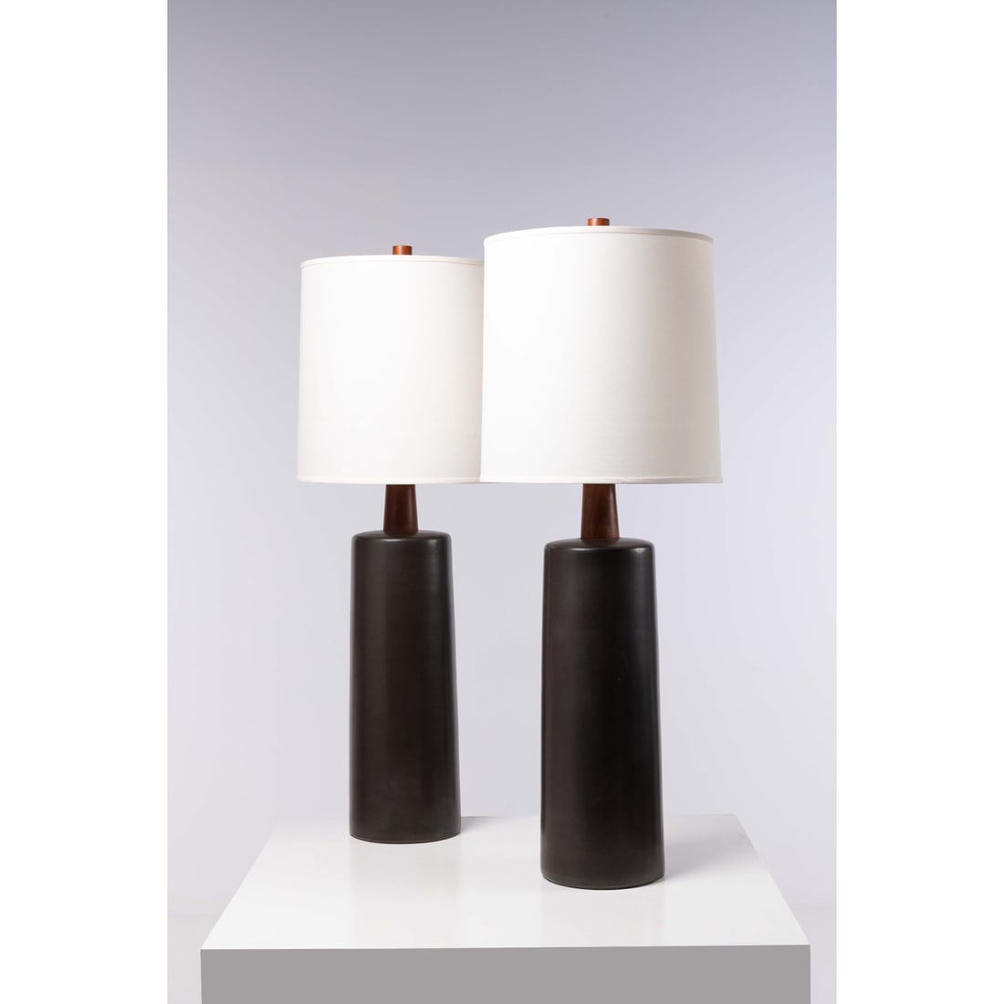 Jane & Gordon Martz (20th c.) Pair of table lamps: Jane & Gordon Martz (20th c.)Pair of table lampsWalnut, ceramic, brass and fabricEdited by Marshall StudiosSigned "Martz" on the baseModel created in the 1960sH 113 × Ø 38,5 cm