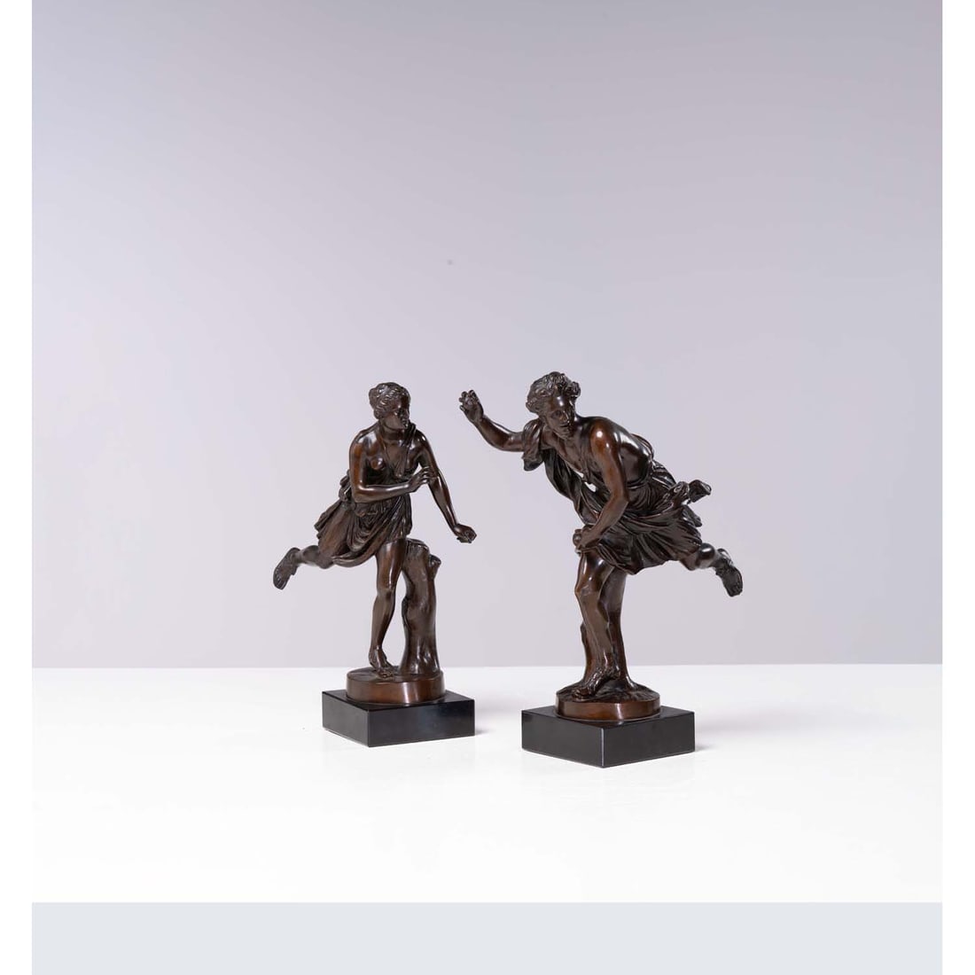 After Guillaume I Coustou and Pierre Lepautre Atalante and Hippomenes: After Guillaume I Coustou and Pierre LepautreAtalante and HippomenesTwo bronze figures with brown patina on a black marble base, reduction stamp ColasH 30 cm (each)