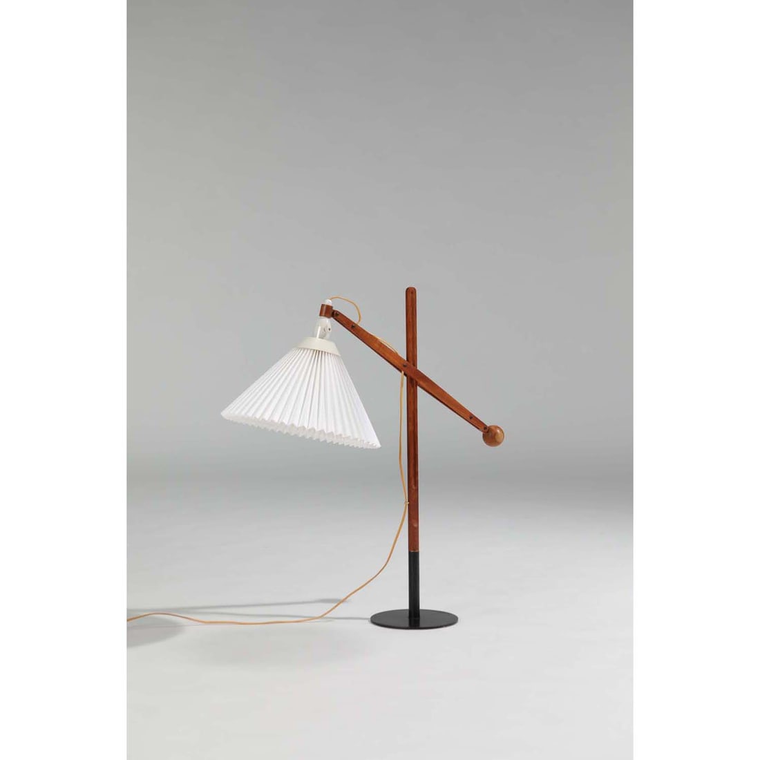 Vilhelm Wohlert (1920-2007) Lamp Teak, lacquered metal and paper Edited by Le Klint Model created: Vilhelm Wohlert (1920-2007)LampTeak, lacquered metal and paperEdited by Le KlintModel created circa 1955H 77 × L 35 × W 70 cm
