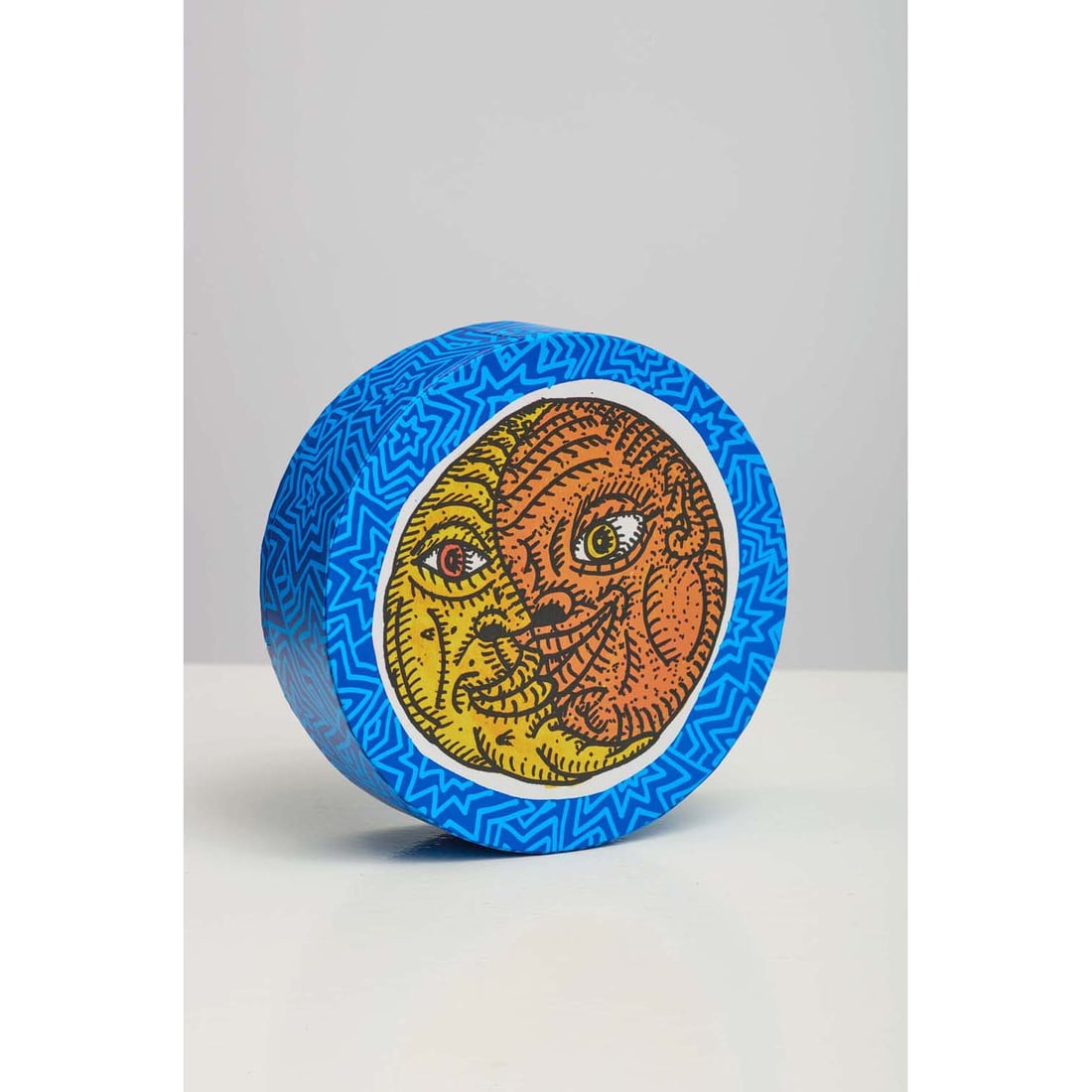 Robert Combas (b: Robert Combas (b. 1957)Le soleil et la lune, 2016Box in cardboard and silkscreened decorationSigned and numbered "78/150" in felt-tip Ø 15 cmThis multiple was created by Robert Combas for the Collect