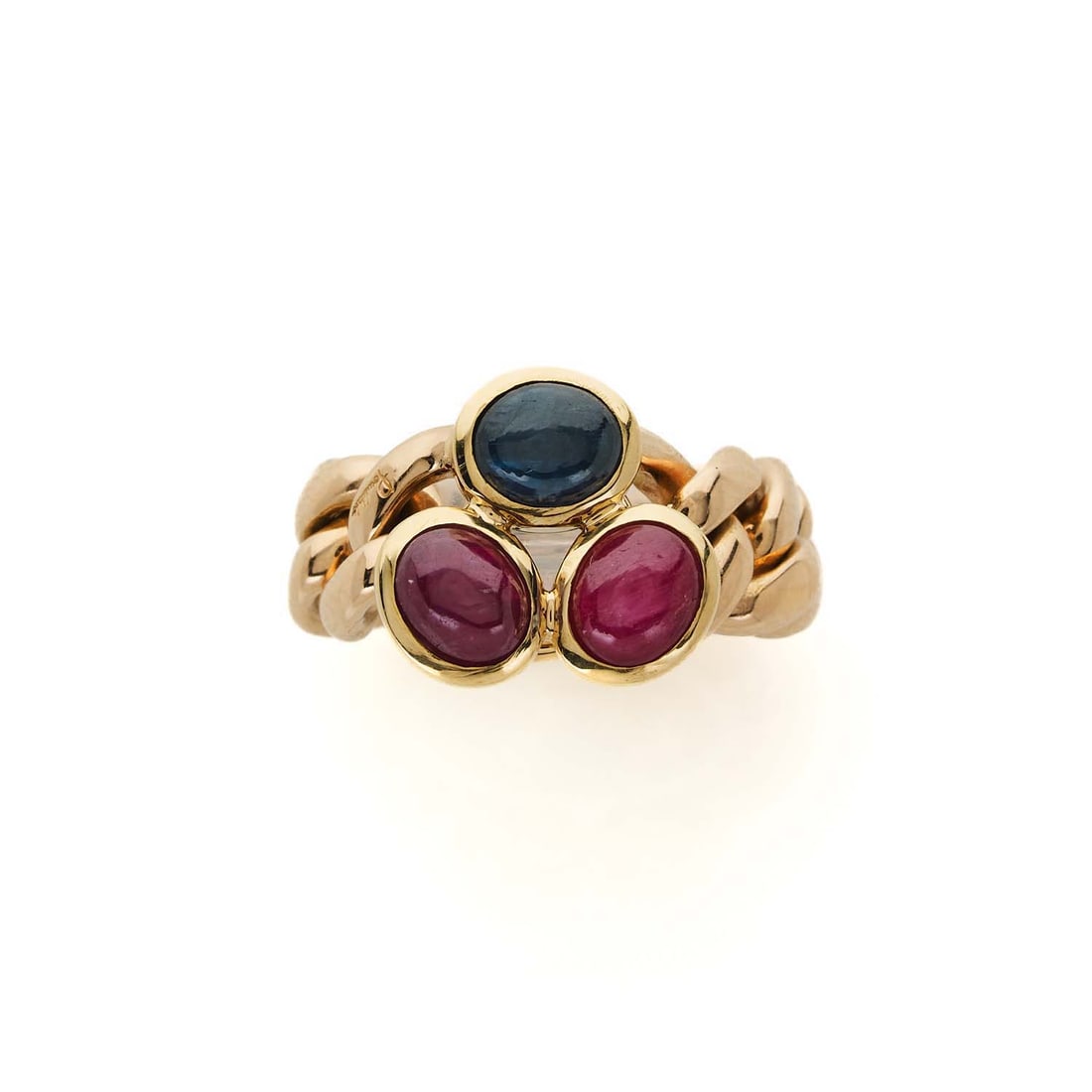 POMELLATO Ring in 18k (750‰) yellow gold adorned with rubies and cabochon sapphire (1 of 4)