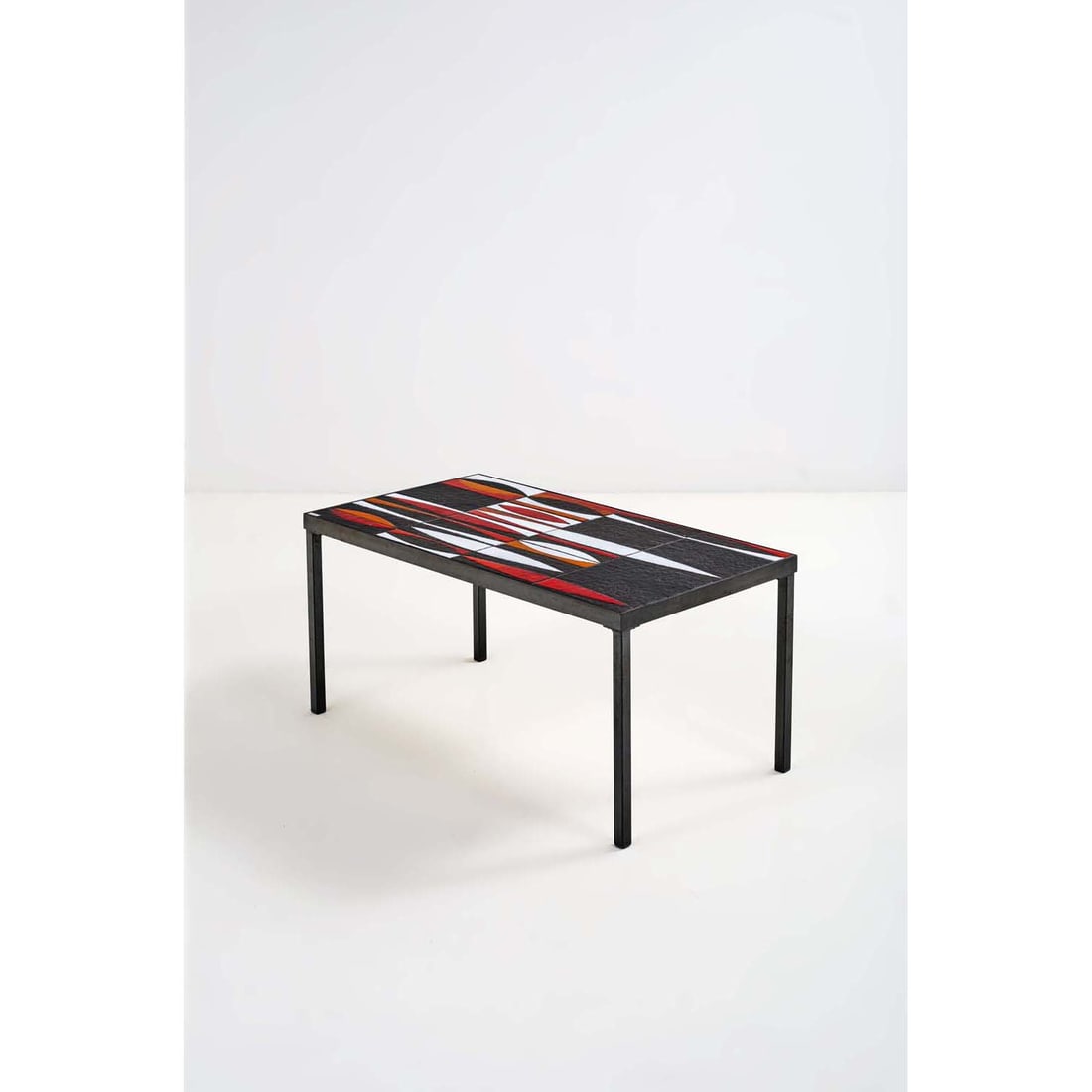 Roger Capron (1922-2006) 'Navette' coffee table: Roger Capron (1922-2006)'Navette' coffee tableEnamelled ceramicSigned in a white enamelled cartouche 'R.Capron'Model created circa 195039 x 80,5 x P 41 cmBibliography:- Roger Capron, céramiste, P
