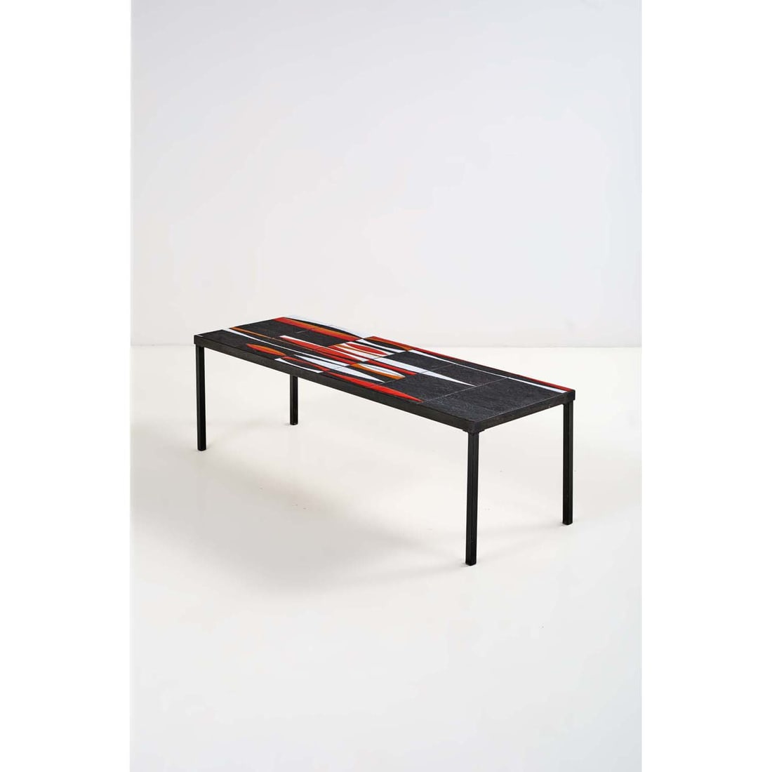 Roger Capron (1922-2006) 'Navette' coffee table: Roger Capron (1922-2006)'Navette' coffee tableEnamelled ceramicSigned in a white enamelled cartouche 'R.Capron'Model created circa 1950H 39 x L 120 x P 38,5 cmBibliography:- Roger Capron, céramis