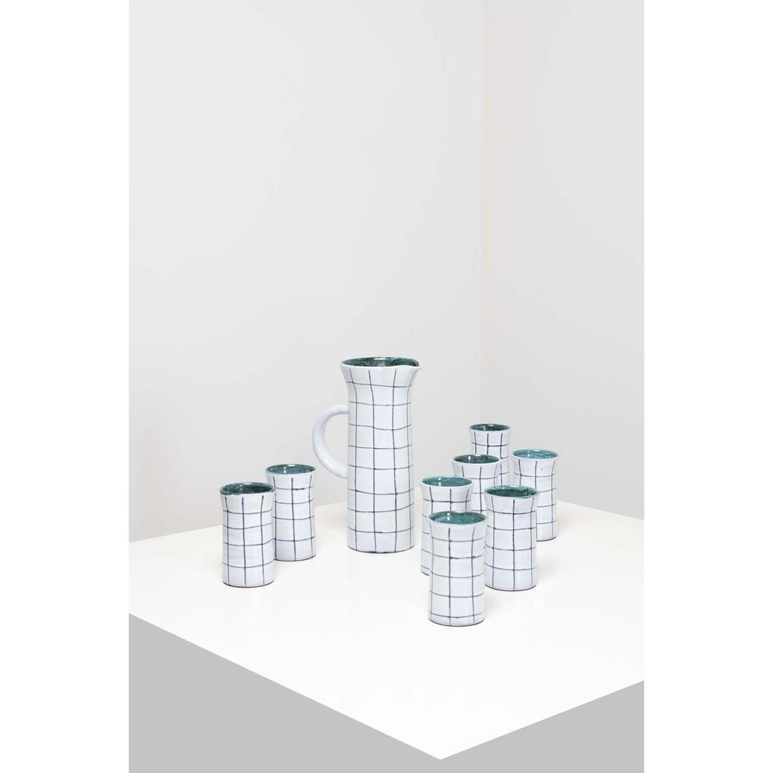 Jacques Innocenti (1926-1961) Orangeade set: Jacques Innocenti (1926-1961)Orangeade setEnamelled ceramicModel created circa 1950H 28,5 cm (pitcher)H 13 cm (glasses)