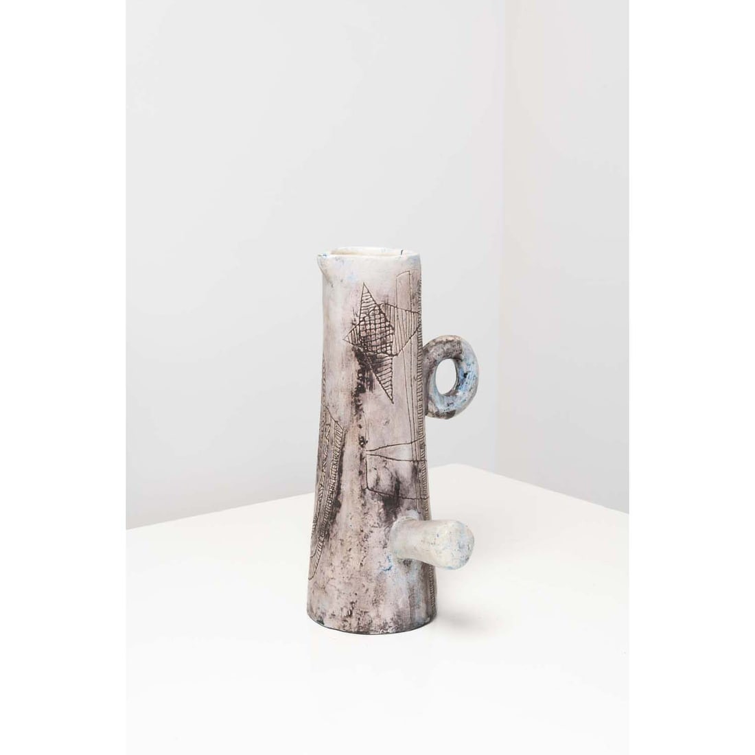 Jacques Blin (1920-1995) Pitcher vase: Jacques Blin (1920-1995)Pitcher vaseEnamelled ceramicSigned and numbered 'J Blin EXEMP N°42' under the baseModel created in 1960H 37 x L 17 x P 19,8 cmProvenance:- Private collection, Paris.