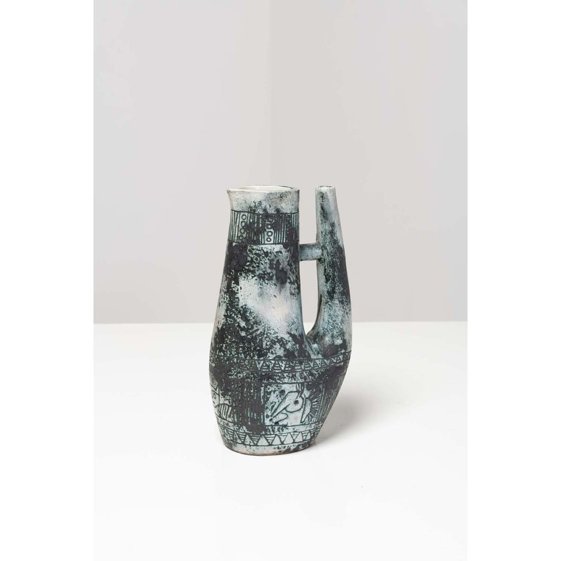 Jacques Blin (1920-1995) Pitcher: Jacques Blin (1920-1995)PitcherEnamelled ceramicModel created circa 1960Signed 'J Blin' under the baseH 27 x L 16 x P 9 cmProvenance:- Private collection, Paris.