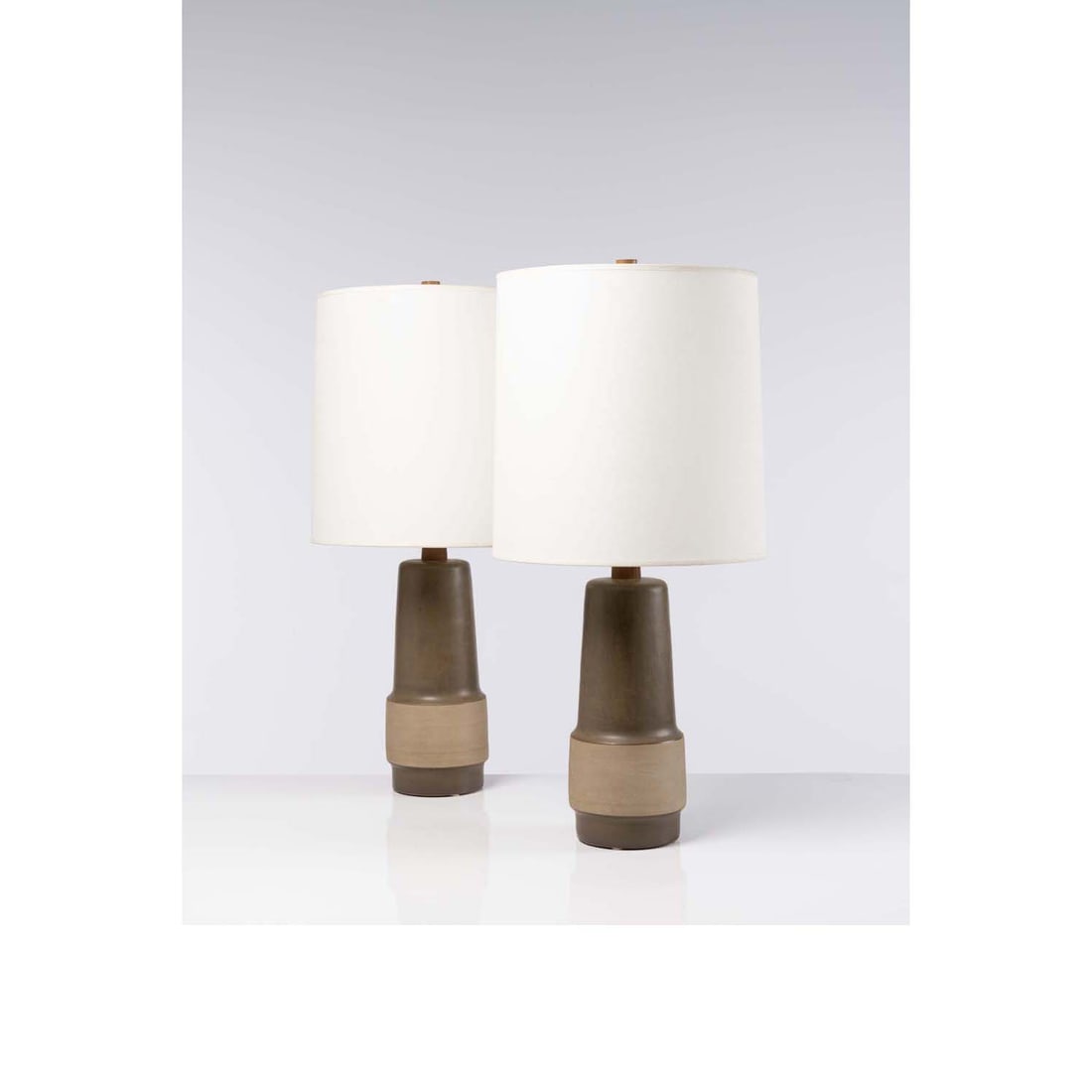 Jane & Gordon Martz (20th c.) Pair of table lamps: Jane & Gordon Martz (20th c.)Pair of table lampsCeramic, brass, walnut and fabricEdited by Marshall StudiosSigned "Martz"Model created in the 1960sH 86 × Ø 38 cm