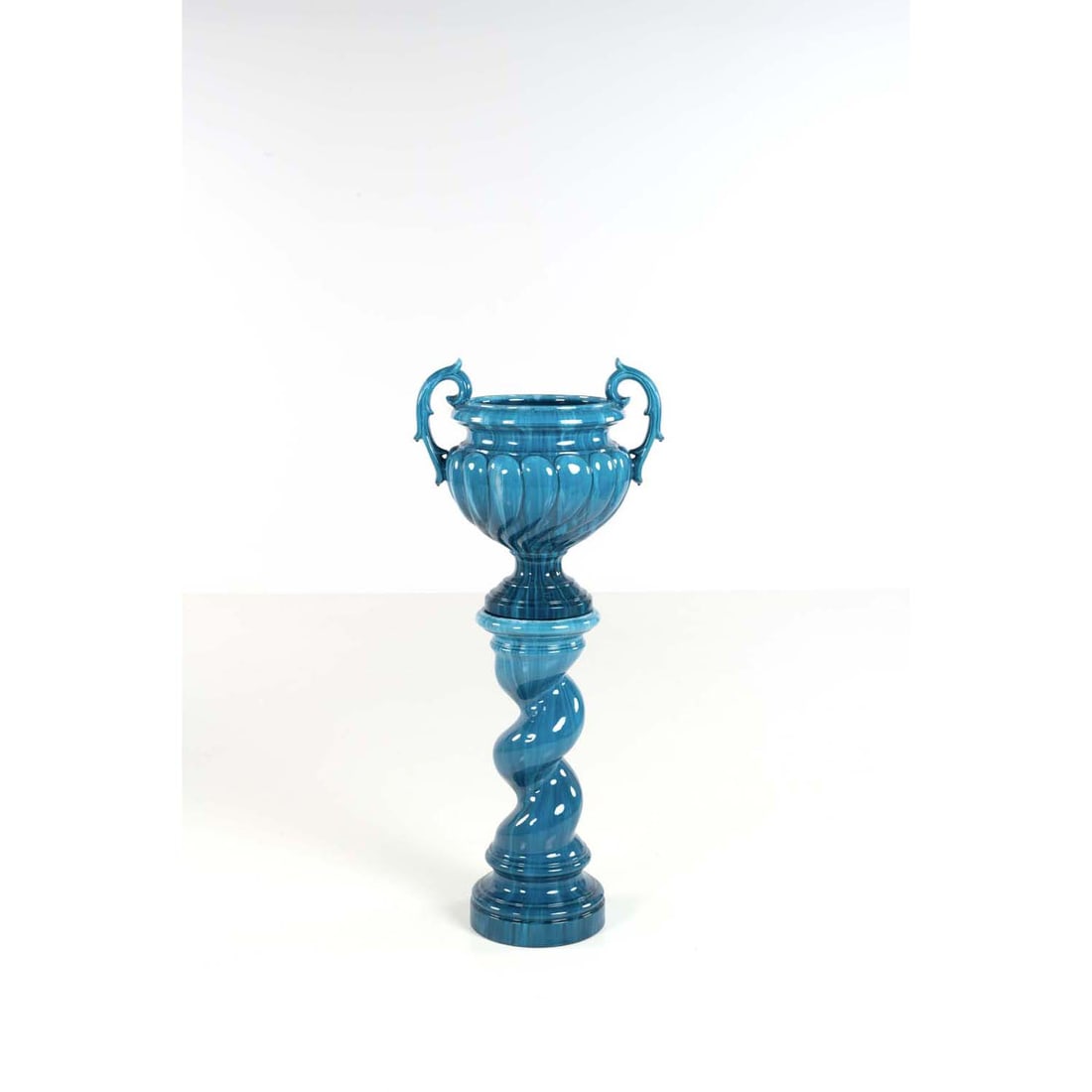Jerome MASSIER (1850-1926): Jerome MASSIER(1850-1926)Godron cup on pedestal resting on a twisted columnTurquoise glazed ceramicOval stamp below the base of the column 'Jerome Massier Vallauris France Column H 75 cmCup H 58 x 54