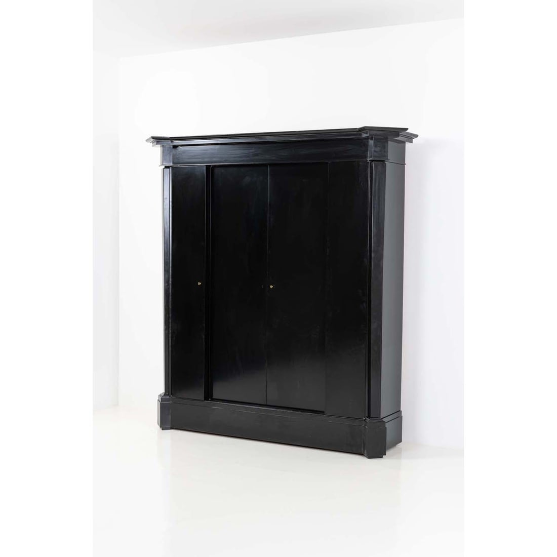 Andre Arbus (1903 - 1969) Armoire: Andre Arbus (1903 - 1969)ArmoireBlack lacquered oakModel created circa 1950H 220 x W 213 x D 63 cmProvenance Galerie Yves Gastou, to current ownerA variant model of the cabinet, narrower, was commissi