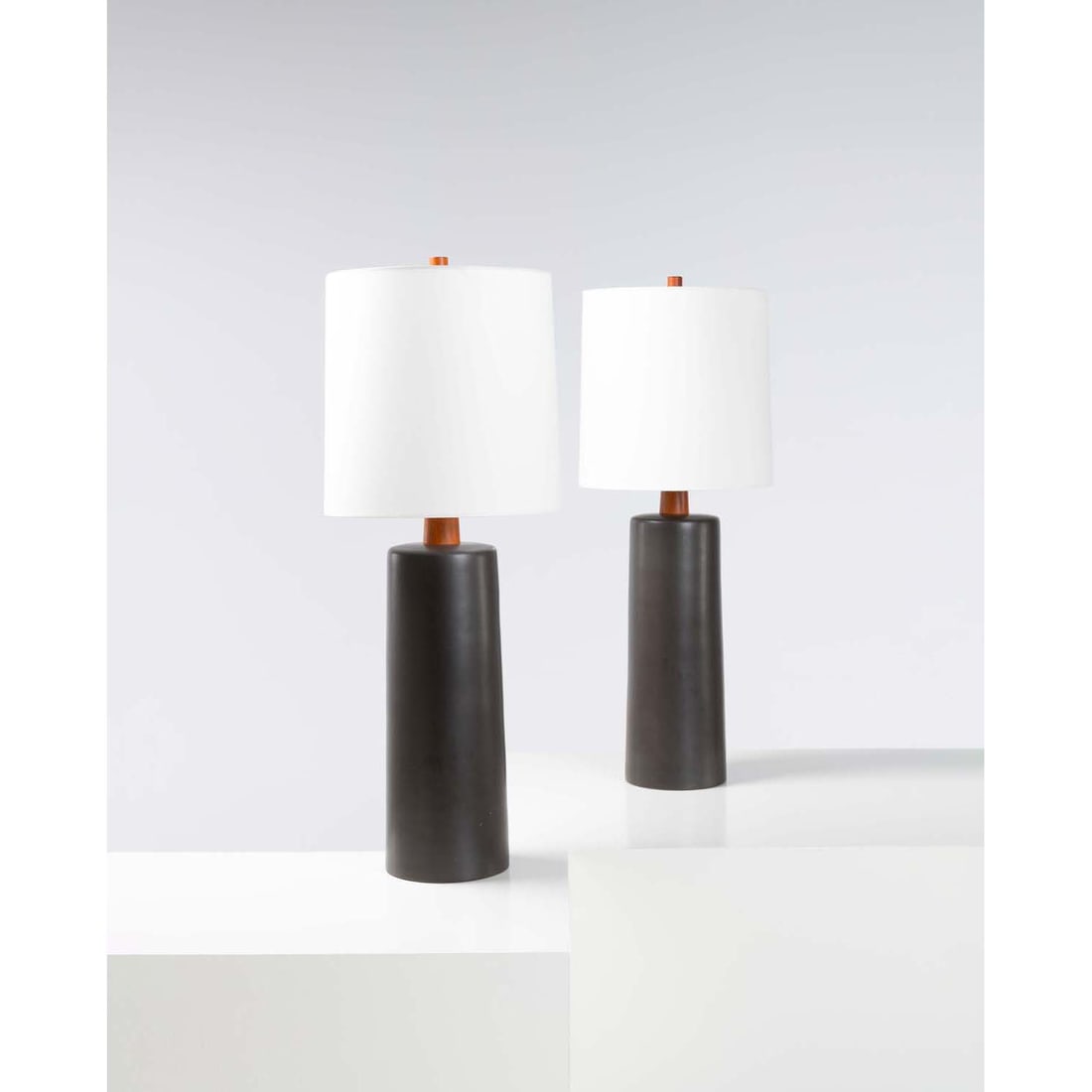 Jane & Gordon Martz (20th c.) Pair of table lamps: Jane & Gordon Martz (20th c.)Pair of table lampsCeramic, walnut, brass and fabricEdited by Marshall StudiosSigned 'Martz' on the basesModel created in the 1960sH 106 × Ø 40 cm