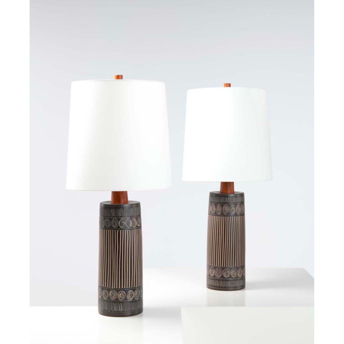 Jane & Gordon Martz (20th c.) Pair of table lamps: Jane & Gordon Martz (20th c.)Pair of table lampsCeramic, walnut, brass and fabricEdited by Marshall StudiosSigned 'Martz' on the basesModel created in the 1960sH 92 × Ø 40 cm