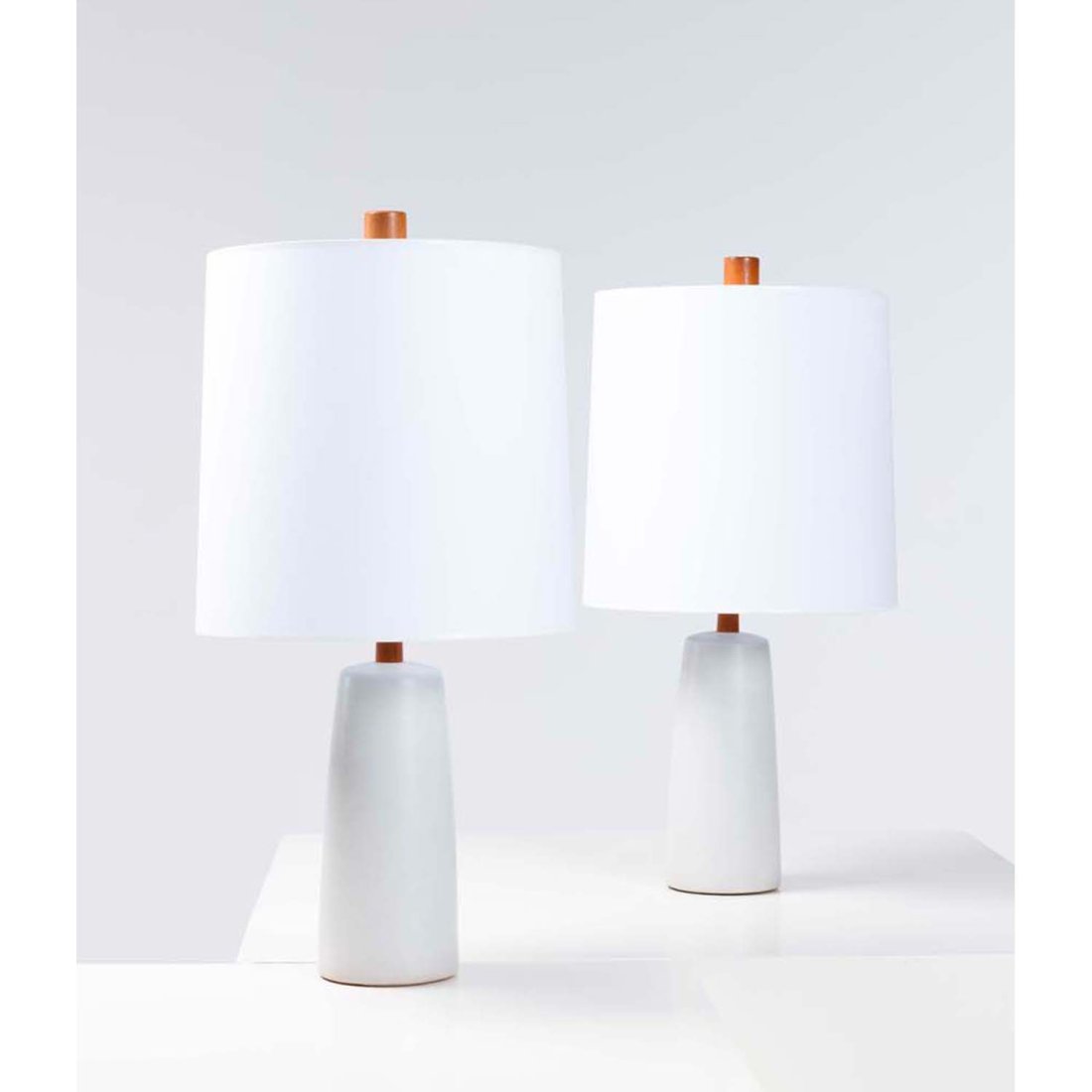 Jane & Gordon Martz (20th c.) Pair of table lamps: Jane & Gordon Martz (20th c.)Pair of table lampsCeramic, walnut, brass and fabricEdited by Marshall StudiosSigned 'Martz' on the basesModel created in the 1960sH 71,5 × Ø 35 cm