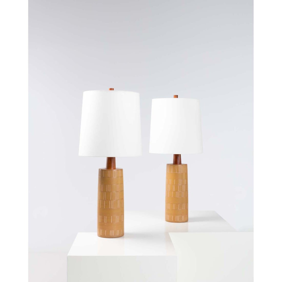 Jane & Gordon Martz (20th c.) Pair of table lamps: Jane & Gordon Martz (20th c.)Pair of table lampsCeramic, walnut, brass and fabricEdited by Marshall StudiosSigned 'Martz' on the basesModel created in the 1960sH 94,5 × Ø 40 cm