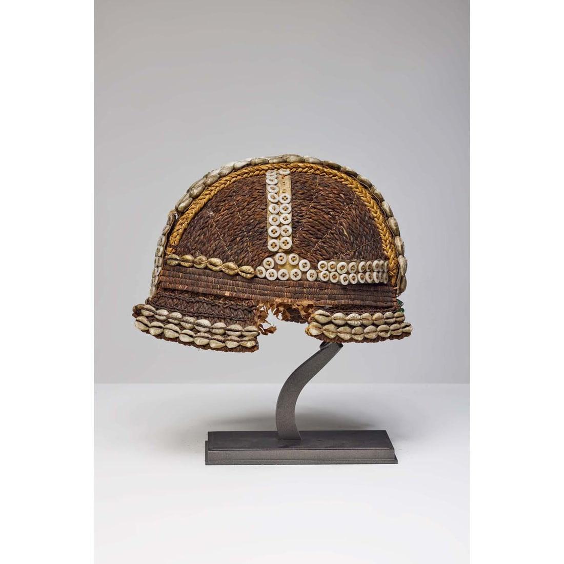 Fang warrior headdress Gabon Fibres, cowries, buttons and beads Late 19th century H: 13 cm ; L: 25 (1 of 2)
