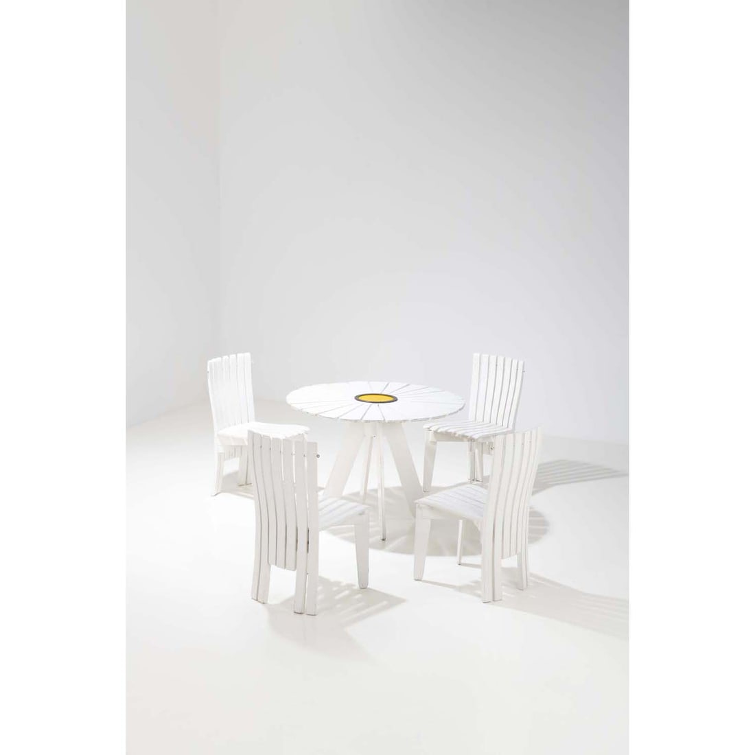 Alvar Aalto (1898-1976) and Aino Aalto (1894-1949) Set composed of a table, model no. 330,: Alvar Aalto (1898-1976) and Aino Aalto (1894-1949)Set composed of a table, model no. 330, 'Sunflower' and four chairsLacquered wood, lacquered metal and brassEdited by ArtekModel created circa 1938Tab